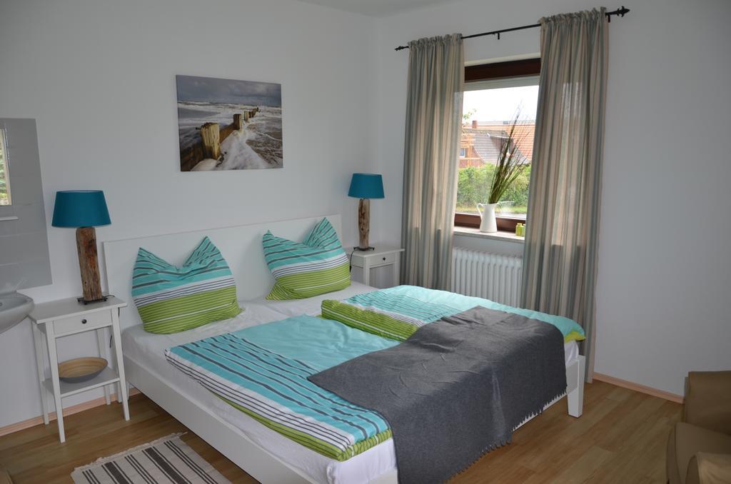 Hotel&Ferienunterkünfte Hus Seeblick Fehmarn Habitación foto